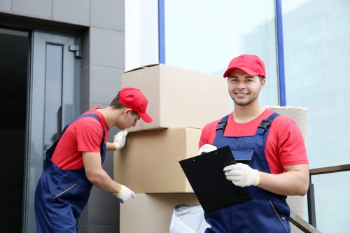 Professional Surrey movers preparing items carefully for relocation