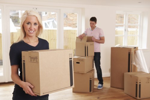Protective wrapping and loading of home furniture