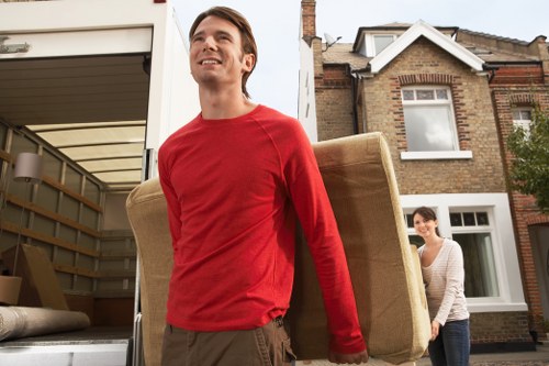 Removal van loading furniture from a Surrey property