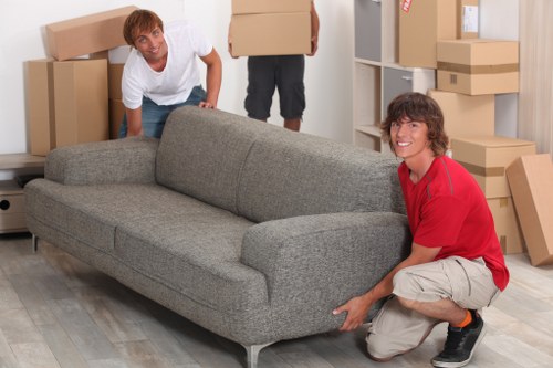 Local packing team preparing a family house for moving day in Surrey
