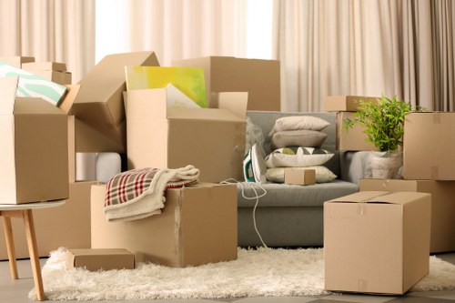 Unpacking service arranging boxes in a new Surrey property room by room