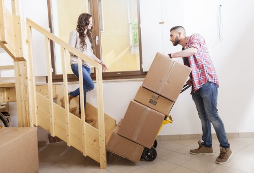 Packed boxes and furniture prepared for a local removal service