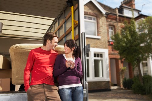 Local team removing a sofa and other furniture in Surrey